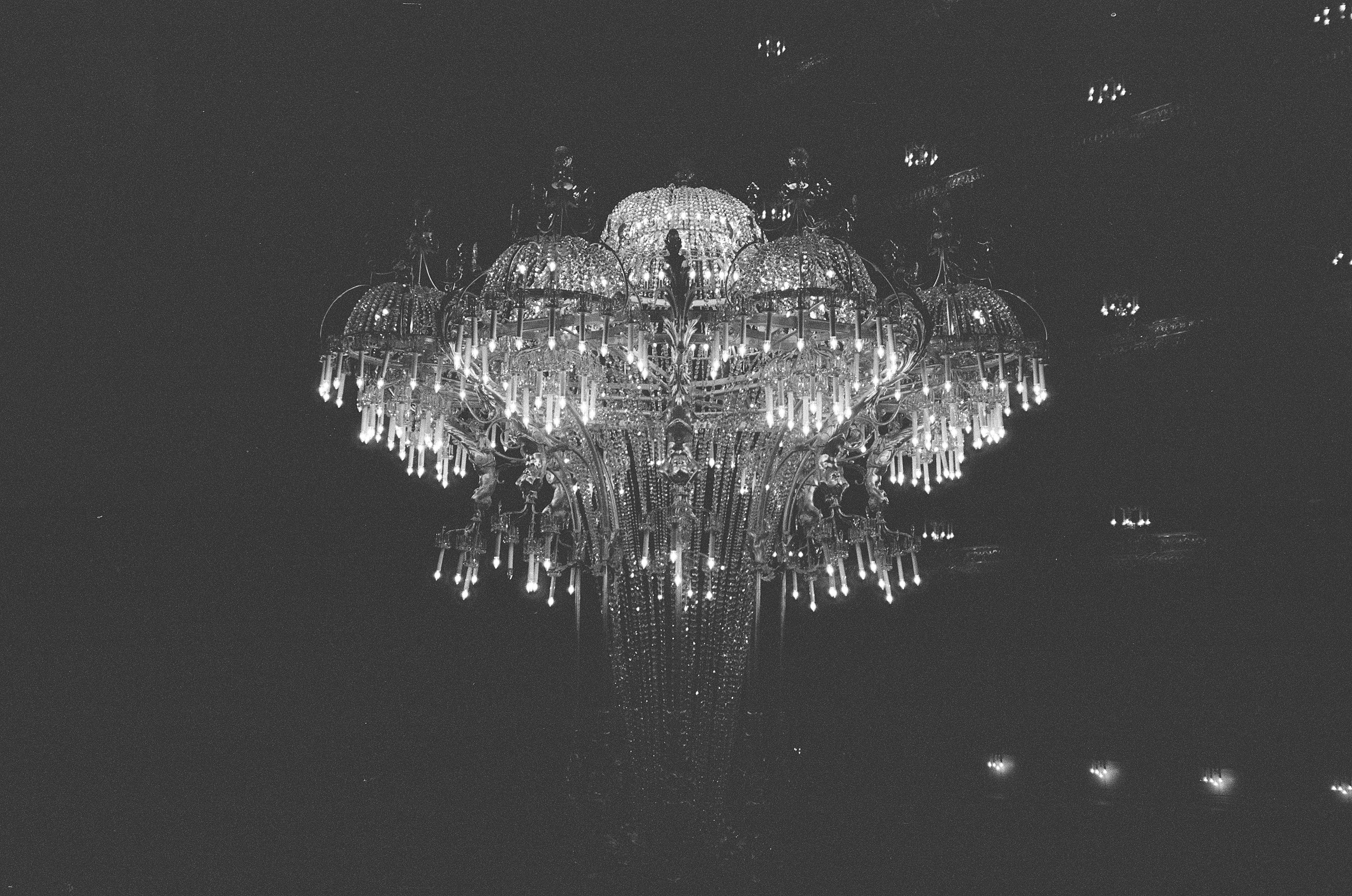 Grand multi-level crystal chandelier in black and white