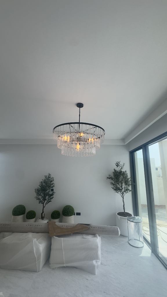 Modern circular chandelier with clear crystal drops