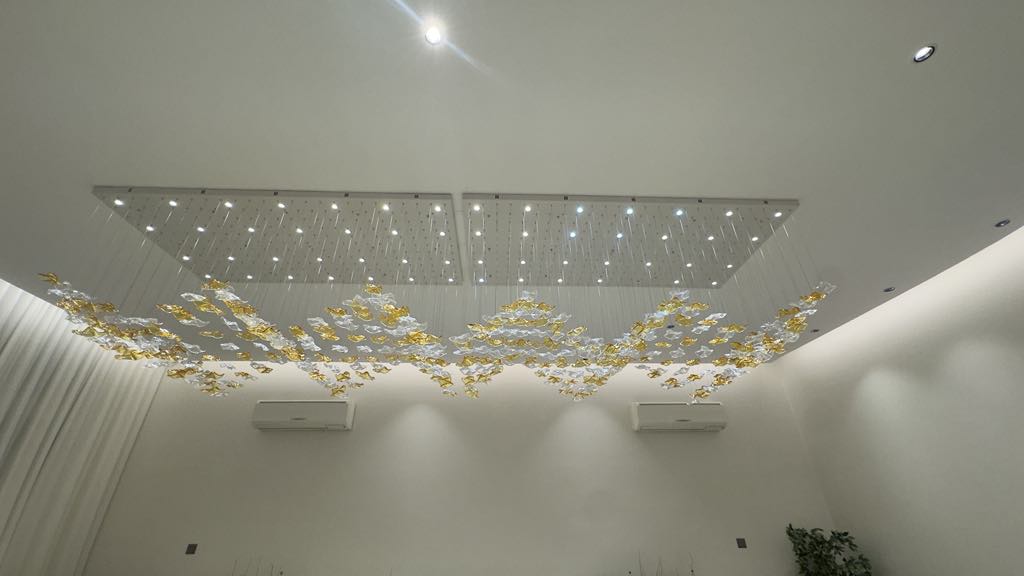 Rectangular chandelier with golden and clear glass leaves